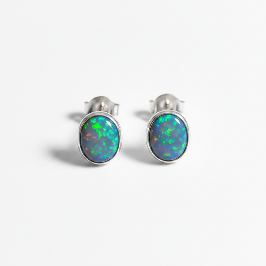 a set of simulated sapphire earrings with silver posts